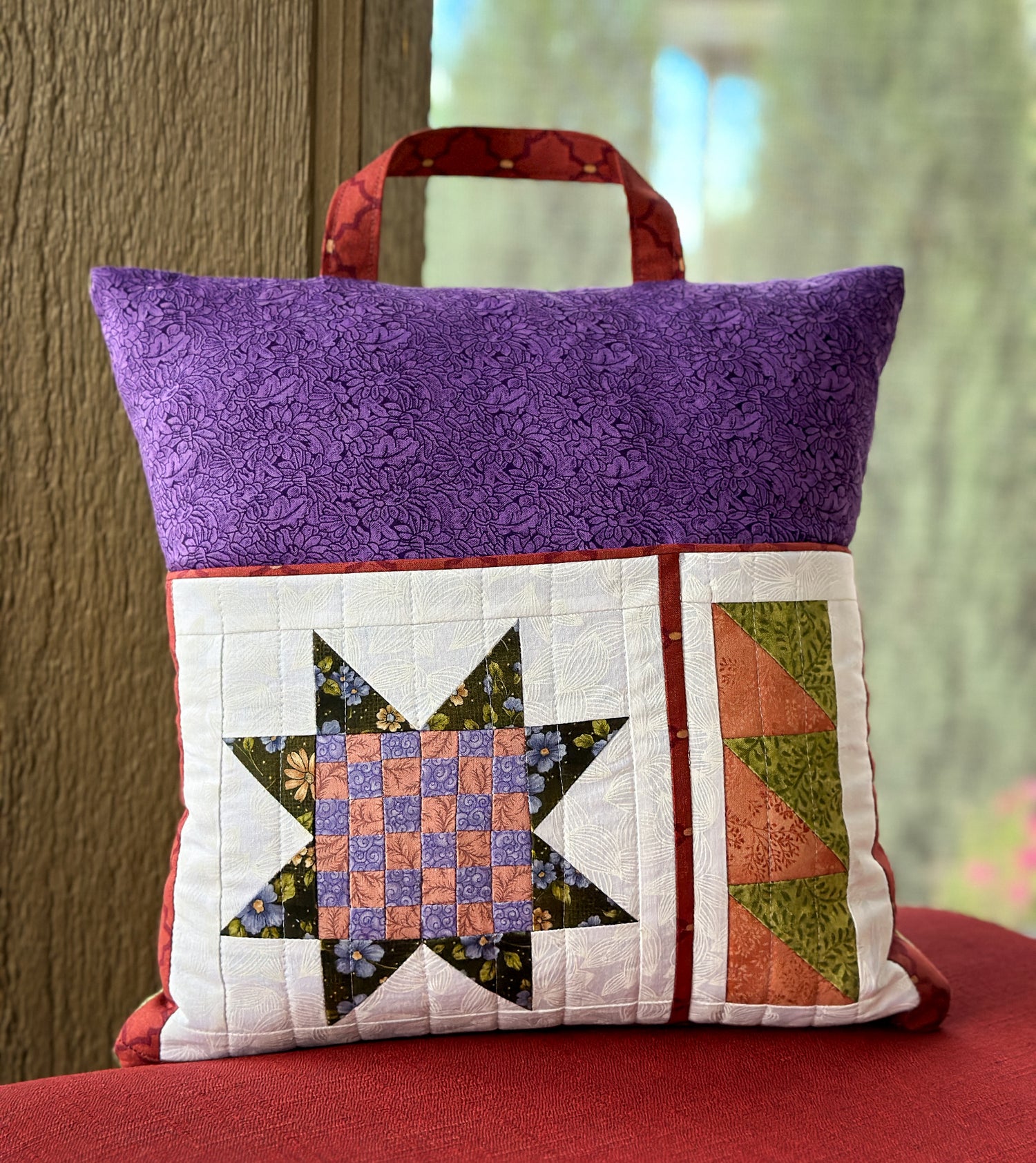  a pillow with pocket featuring a sawtooth star patchwork design