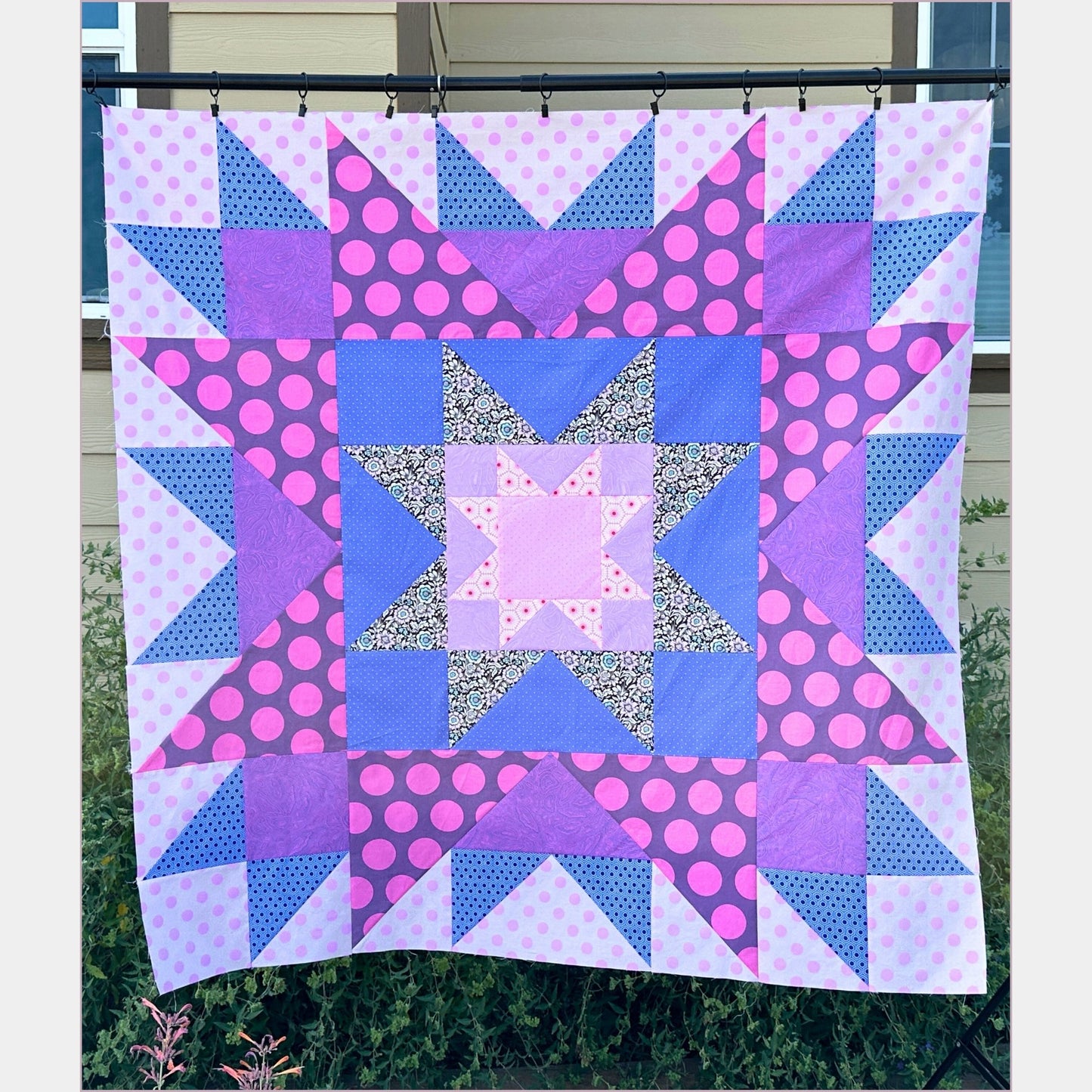 image of a completed quilt top example by leslie