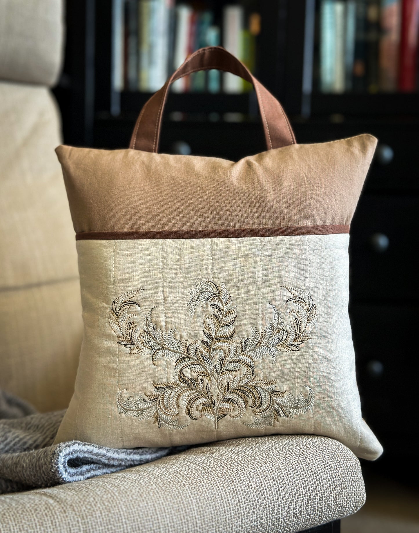 Feather Embroidered Pillow with Quilted Pocket & Carry Handle